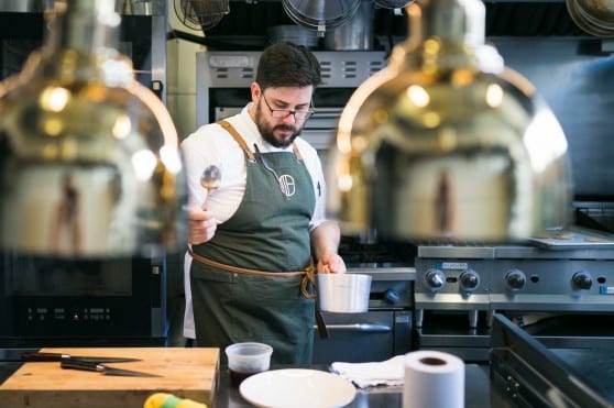 a chef preparing food at Hopkins